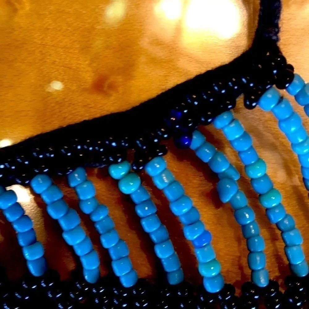 Vintage 60’s tie beaded dance skirt necklace or wall hanging cowrie shell bead